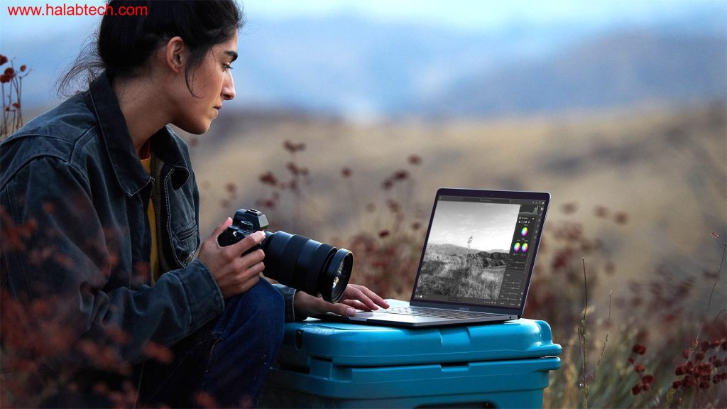 تصوير تمثيلي لـMacBook Pro مع رمز 5G يرمز إلى دمج الاتصال الخلوي في الحواسيب المحمولة